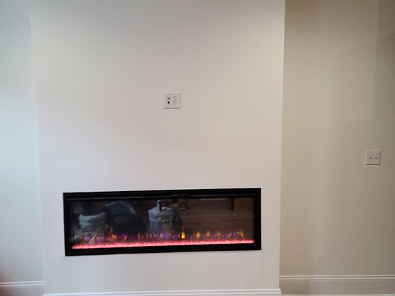 Remote controlled fireplace under your TV creates a cozy ambiance
