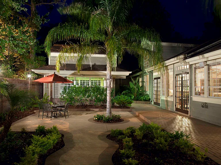 Outdoor lounge patio at dusk