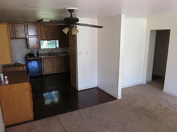Open concept. Carpet and wood combination.