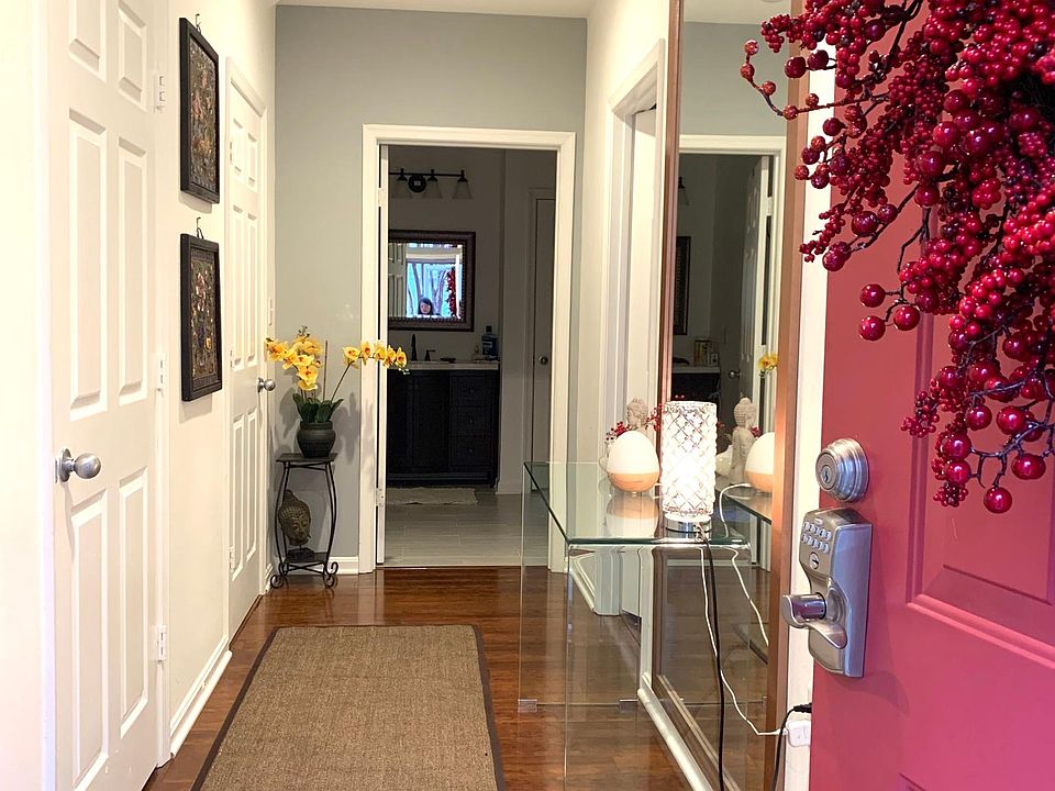 Main entrance foyer. Master suite 1 with walk-in closet and full bath.