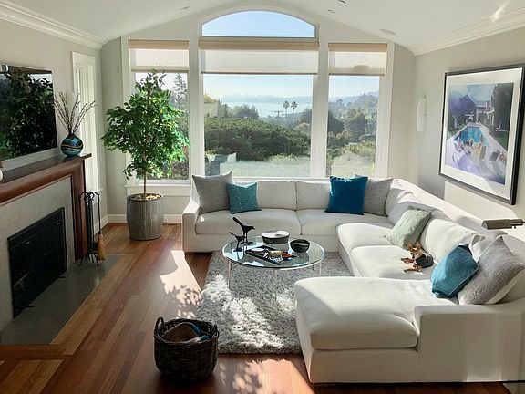 Living room furnished (gray walls have been painted white)