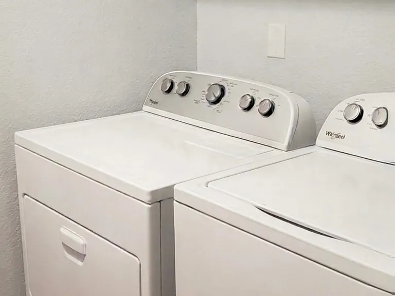 Washer /Dryer off hallway, Iron and Ironing Board etc.