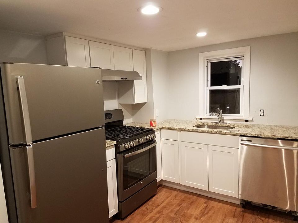Brand new kitchen with granite countertops and stainless ste