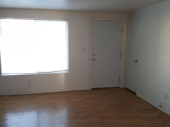 Open living area with big window.