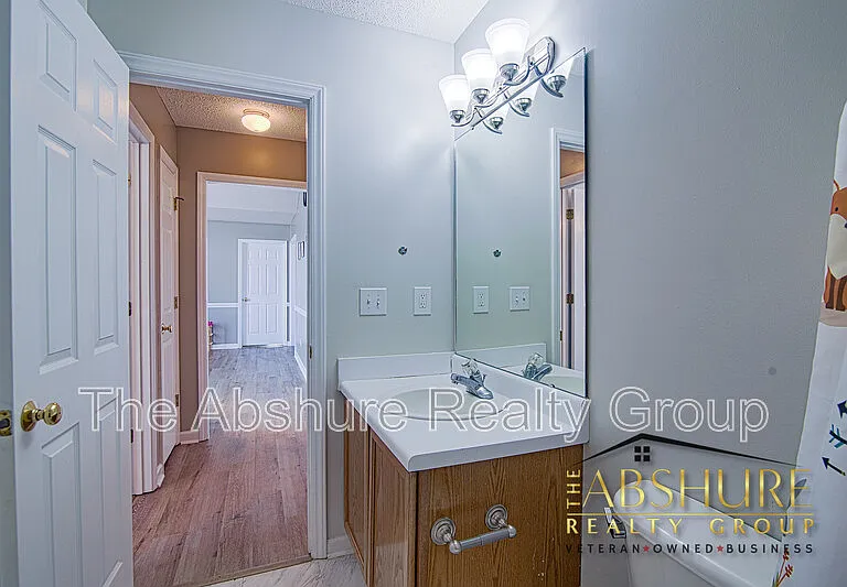 7604 Lilly Pond Ln — Photo 10