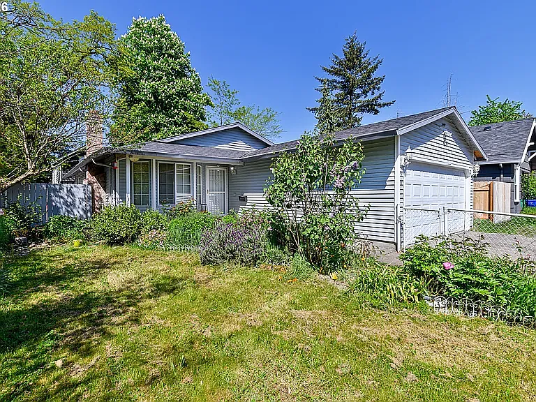 9707 SE Reedway St — Photo 3