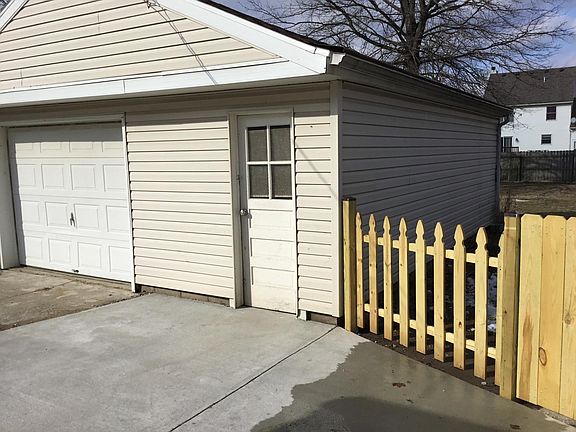 Back patio to garage entry door and back fenced in yard