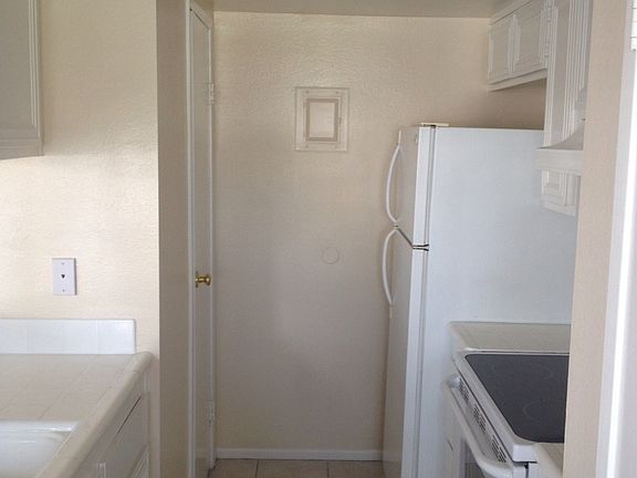 Kitchen with fridge and oven/range