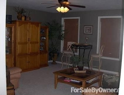 Living Room : 13x14,Ceiling fan, wall to wall carpet, Deck, Cable and Phone Hookup, Blinds