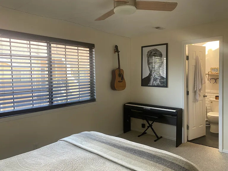 Bedroom, facing the second bathroom entrance.
