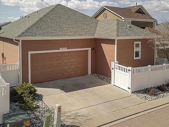 Spacious 2-car garage. Entrance from alley. No grass to mow.