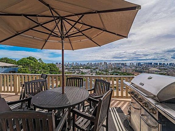 Large deck for relaxing with grill.