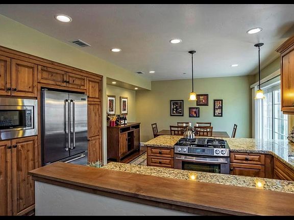 Fully stocked kitchen & dining Area. Granite counter tops and stainless steel appliances.