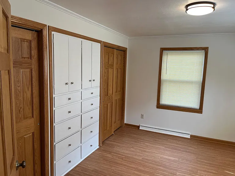 First floor bedroom with built-ins