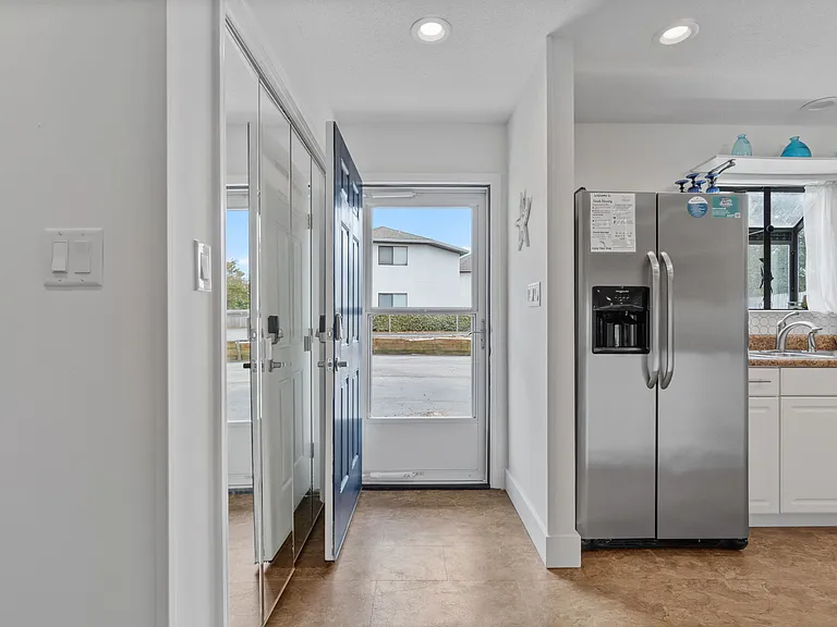 Easy access from parking to kitchen for unloading groceries. Fully equipped kitchen, and granite countertops