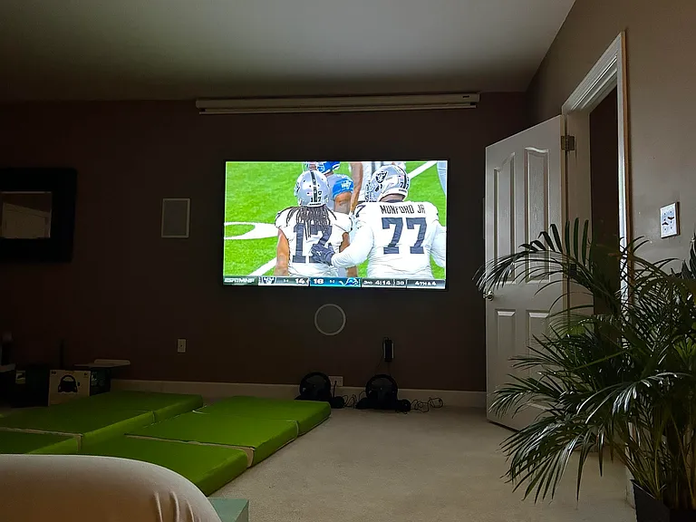 87 inch 4K LG TV with 6 speaker surround. You'll never go to the theater again.
