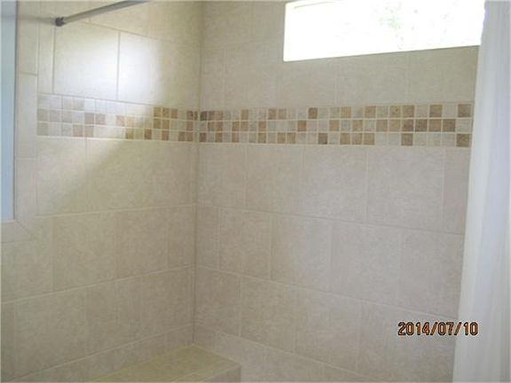 TILE TUB AND SHOWER SURROUND