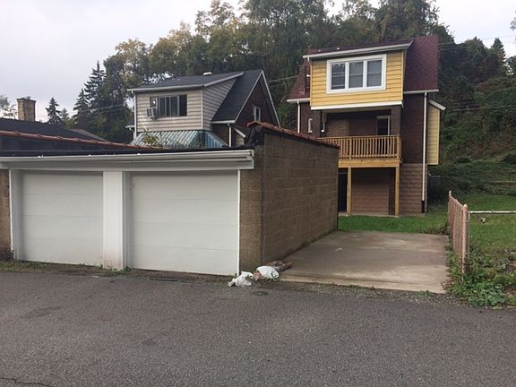 Two car garage with pad