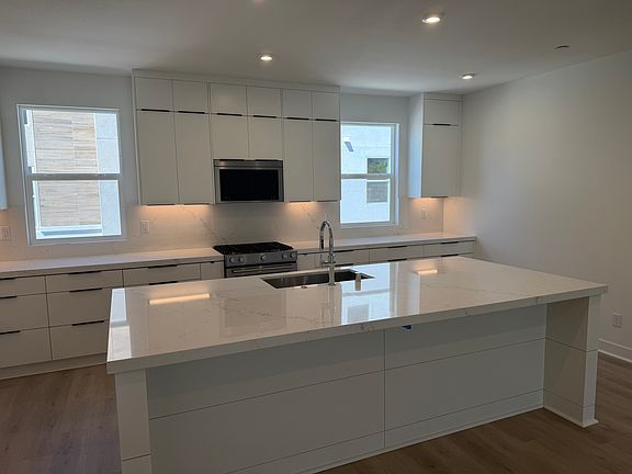 Oversized Kitchen Island for gathering space and day to day cuisine preparation.