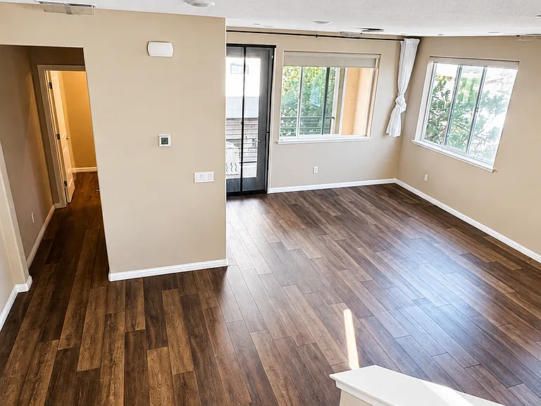 Living Room & Dining Area & Hallway to Washer/Dryer