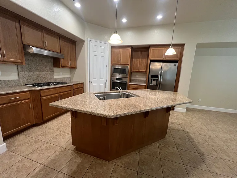 Kitchen with 5 burner gas range