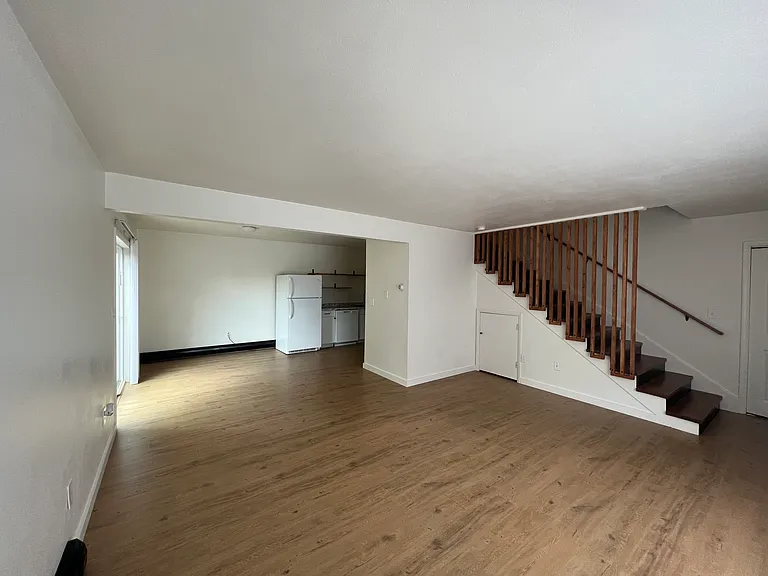 First floor - living room, dining room, kitchen, pantry, laundry, entry closet, under stair storage and sliding door to the fenced patio