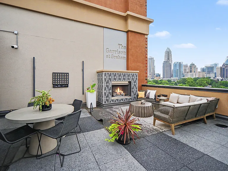 The community terrace has THE best views of the Uptown skyline, two fire places, a new grill and bar, and TVs. Perfect for hosting, can be rented through the HOA for private events