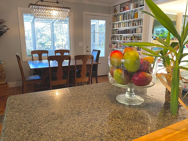 View from kitchen towards three season porch