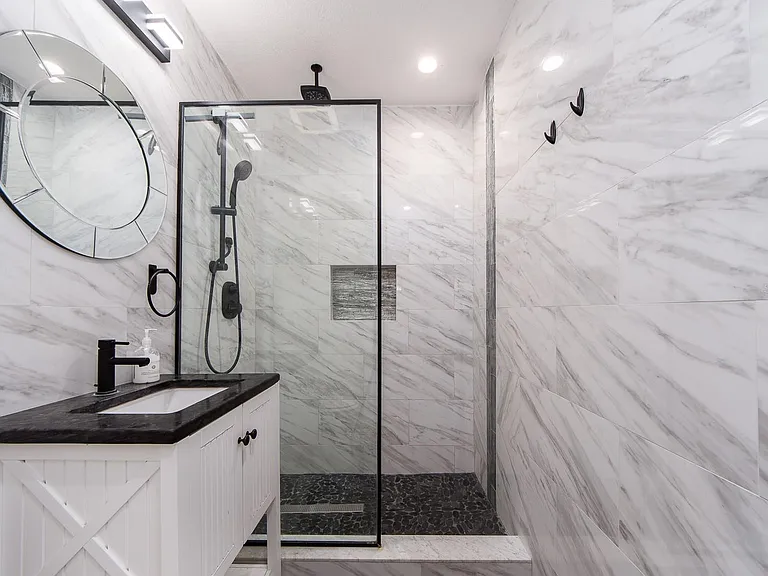 Marble look tiles make for a squeaky clean appearance.