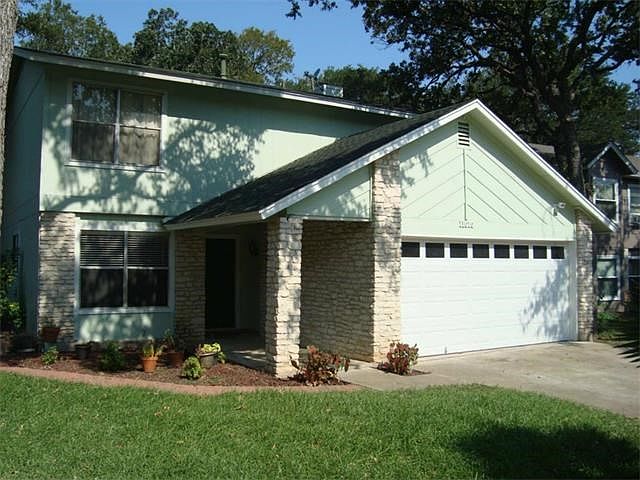 Beautiful two story home on a quiet tree lined street close to the community pool and parks.