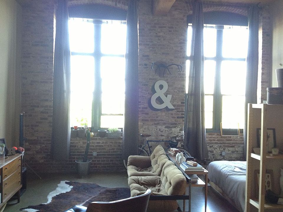 living room w/ 2 big windows