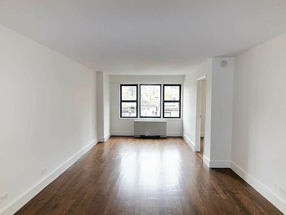 2nd image of 220 E 63rd St Penthouse A0