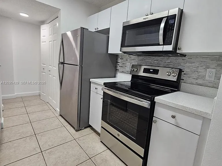 15771 SW 106th Ter #204 — Photo 23