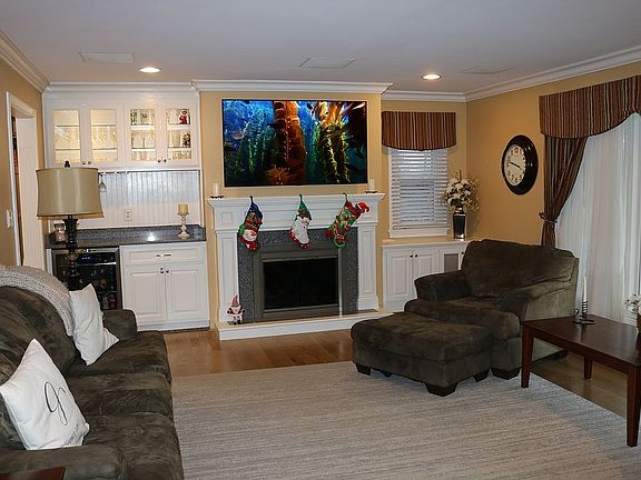 Built-in bar. Gas fireplace.