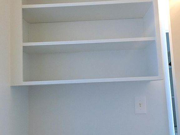 Enjoy built-in bookcase for your books, mementos, and photos.