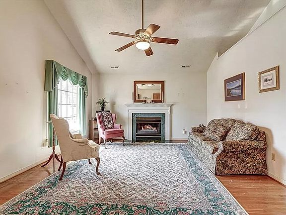 Large living room space with vaulted ceilings
