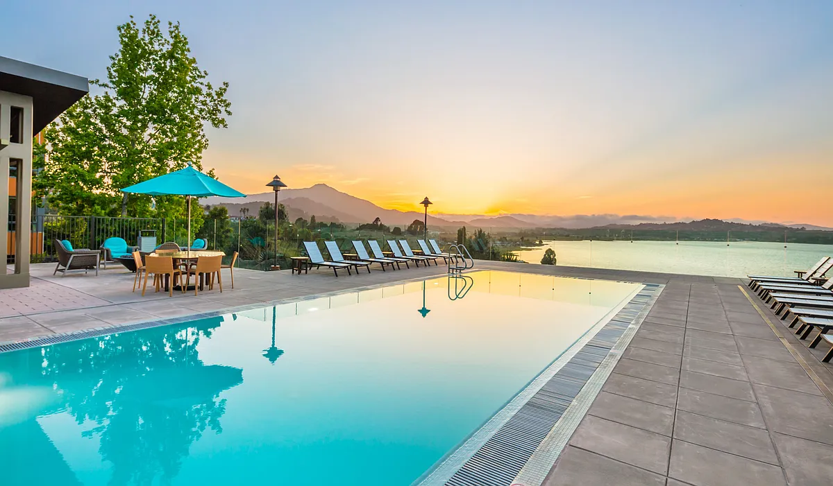 Relax poolside and let the day drift away. - Preserve at Marin