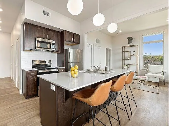 Modern lighting and generous kitchen storage Modern lighting and generous kitchen storage