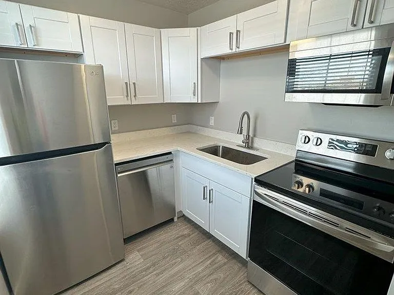 New Brigham Apartments — Photo 17