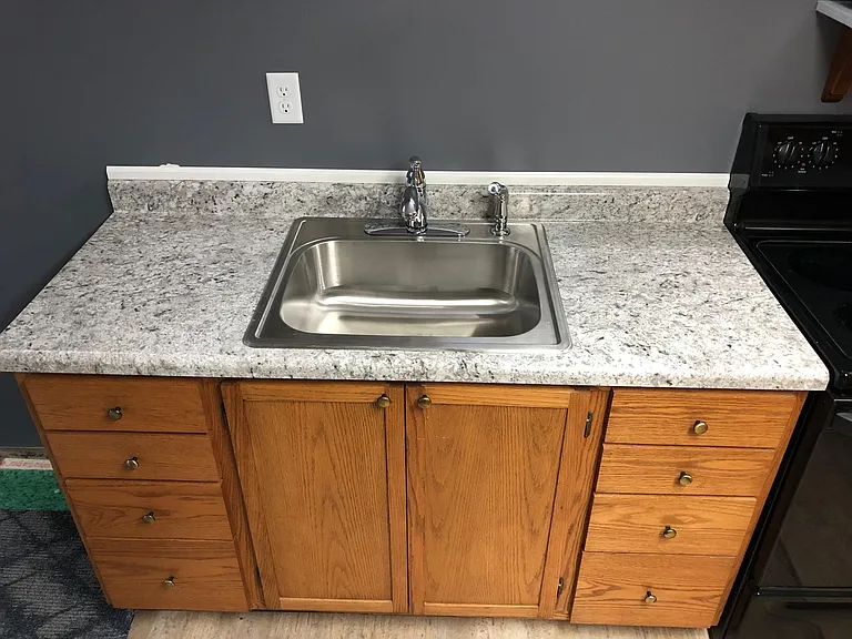 Newer countertops, sink, faucet