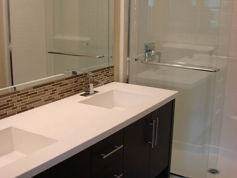 Masterbath - 2 sinks, standup shower with glass shower door. Walk in closet and toilet separate room but also in Masterbath