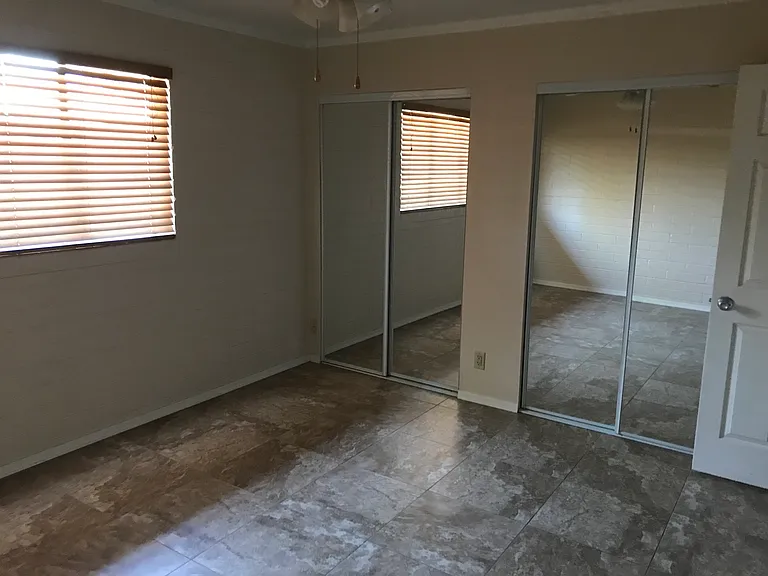 This unit offers exceptional storage space, with each bedroom featuring extra-large closets.