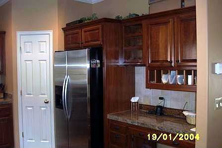 granite, tile, wood floors, stainless appliances