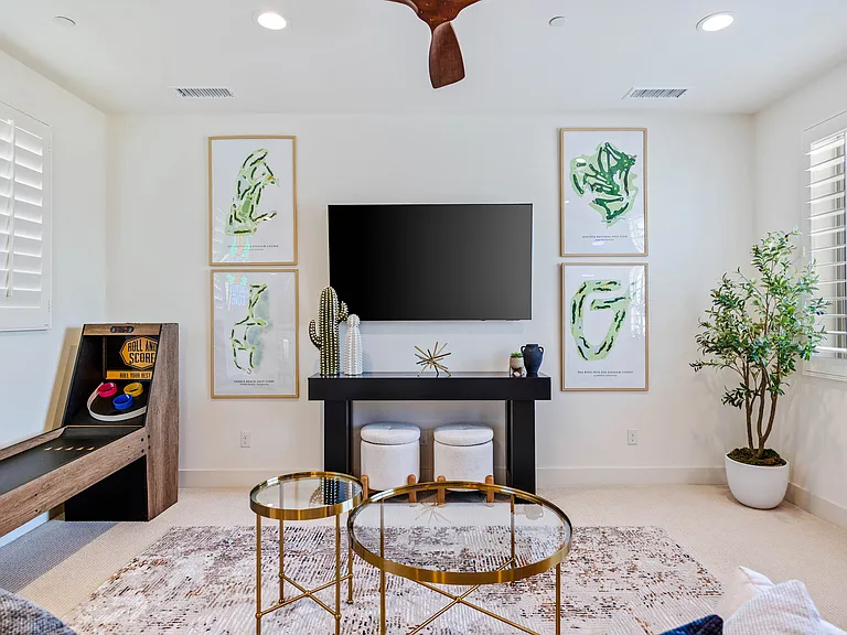 This open space features a smart tv and queen-size sofa sleeper.