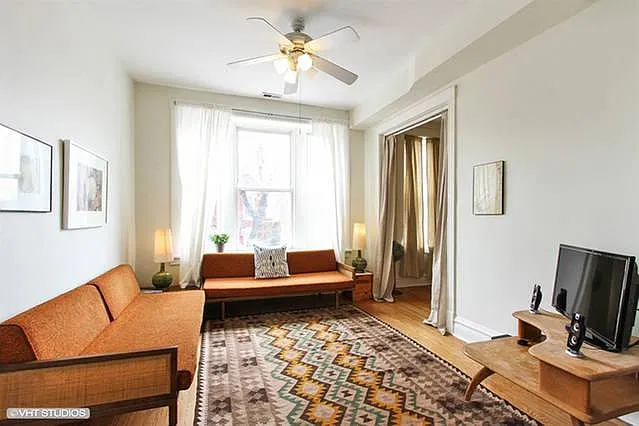 living room (please note current tenant has different furniture)