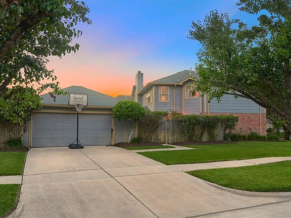 Double wide driveway leads in to the 2 car garage with convenient backyard access.