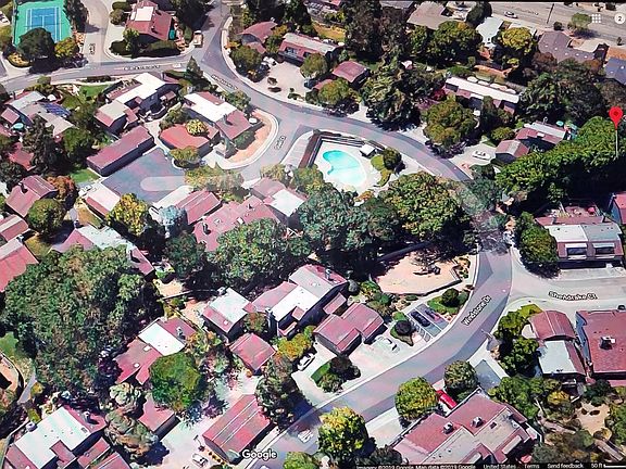 Property is in right lower corner: note fenced playground across the street, with pool behind it. Tennis court in top left corner.