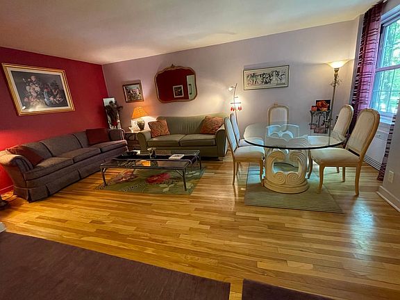 Entry Area/Alternate Dining Area, Living Room/Dining Area (Colored Walls are now a Neutral color)