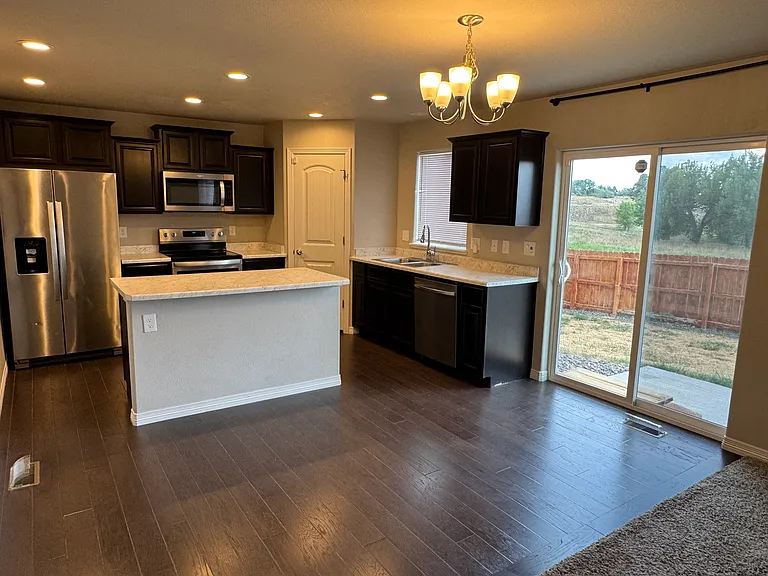6971 Winnicut Dr — Photo 2