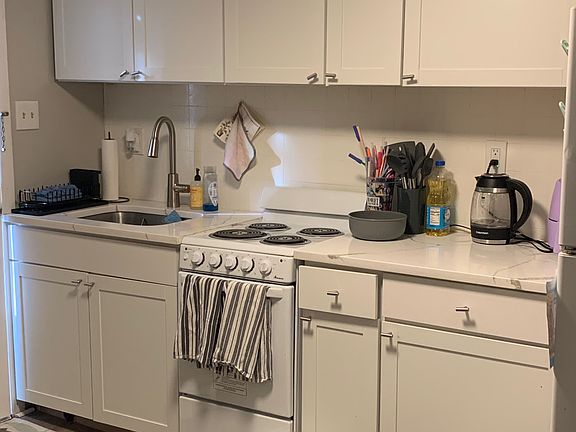 kitchen with newer cabinets/countertop